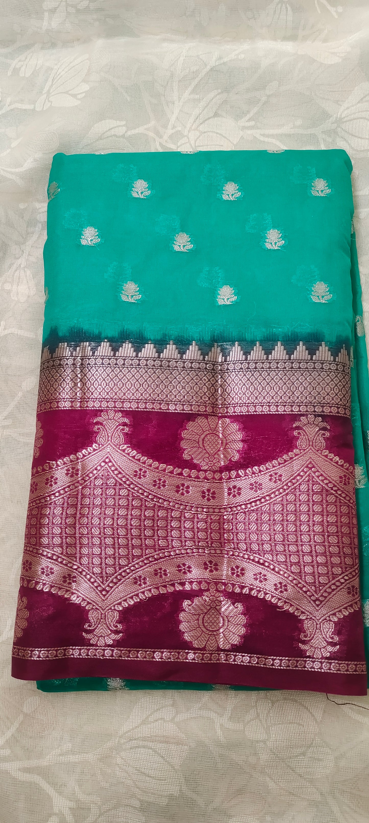 Trquish blue color with pink border silk saree