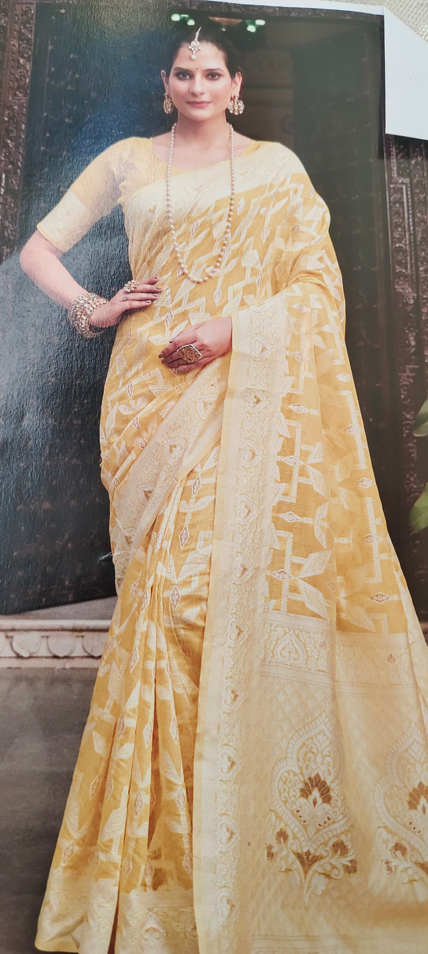 Yellow color cotton silk saree