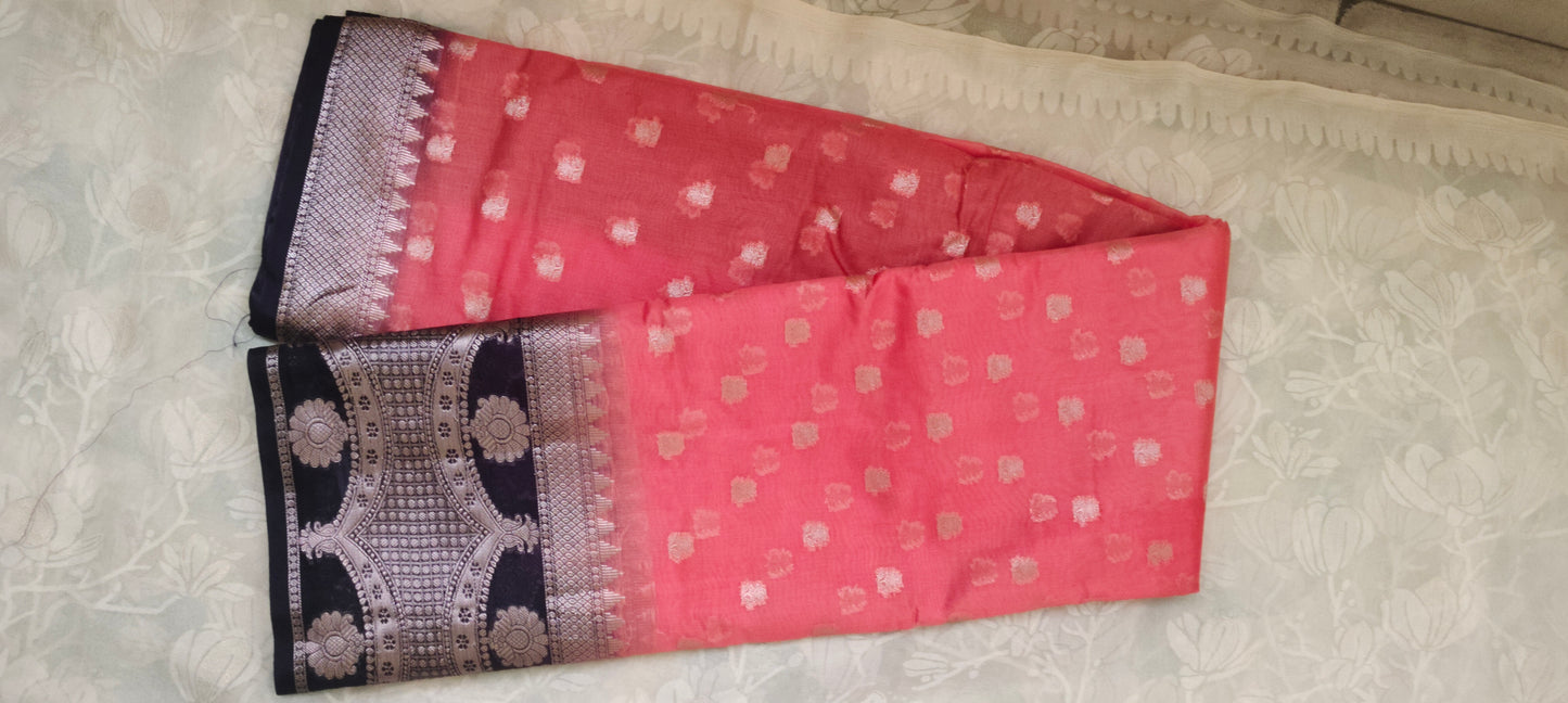 Orange color with pink border silk saree