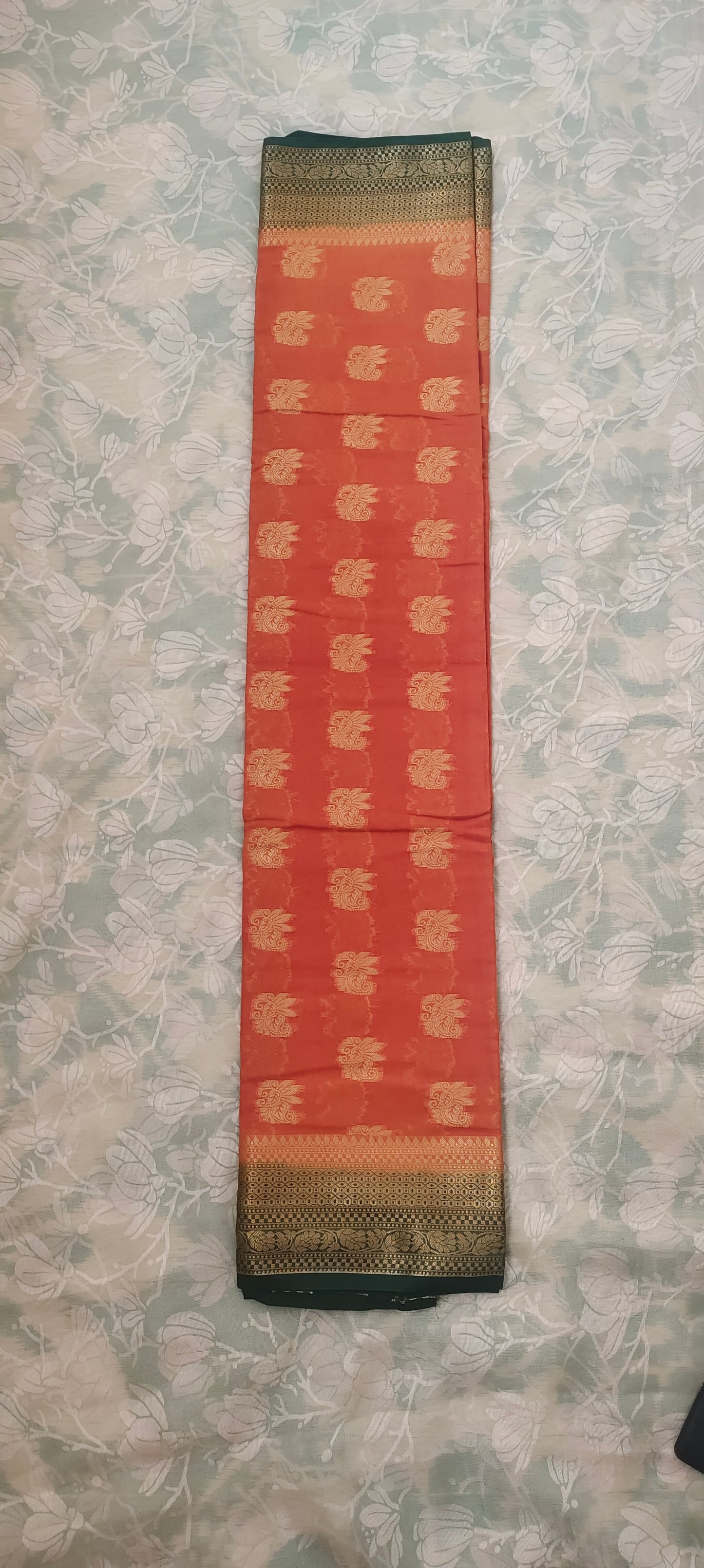 Yellowish Orange color with Green border silk saree