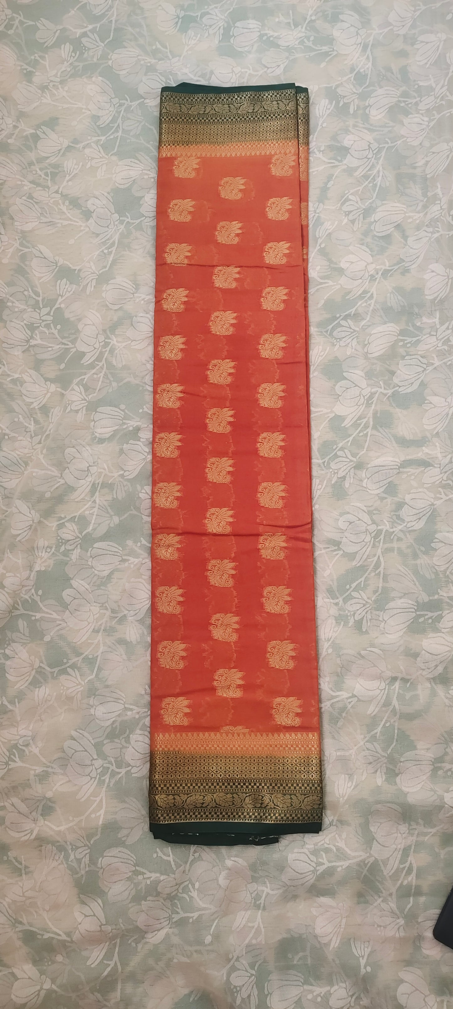 Yellowish Orange color with Green border silk saree