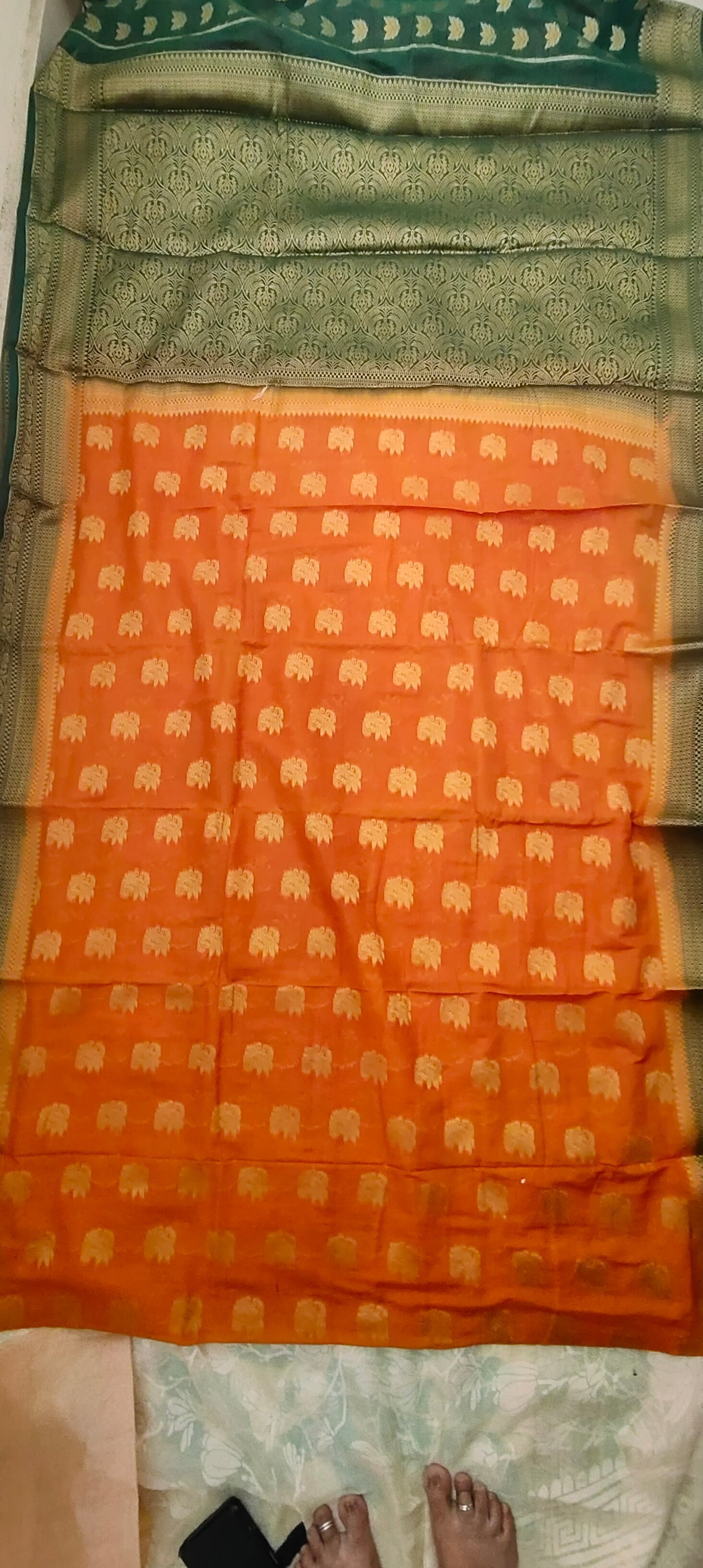 Yellowish Orange color with Green border silk saree