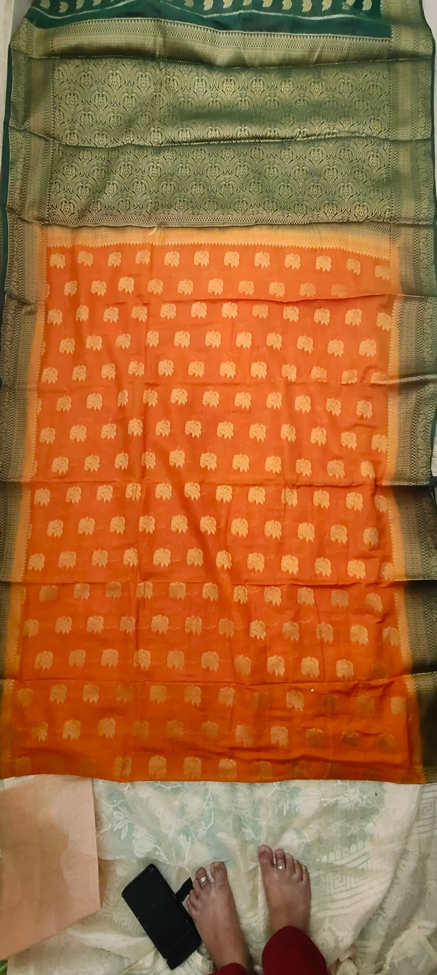 Yellowish Orange color with Green border silk saree