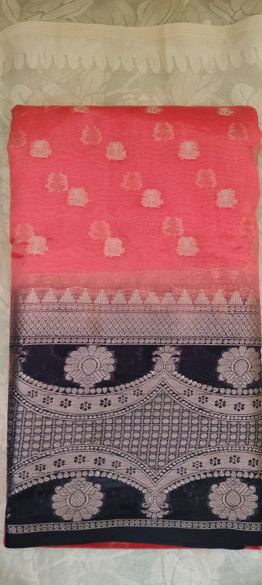 Orange color with pink border silk saree